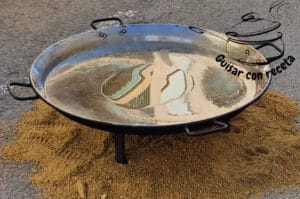 Concurso de paella poner aceite